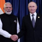 FILE PHOTO: Russian President Putin and Indian Prime Minister Modi