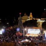 Christmas tree lighting-up outside Church of the Nativity in Bethlehem