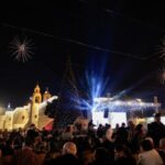 Christmas tree lighting-up outside Church of the Nativity in Bethlehem
