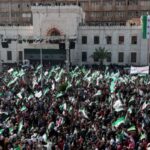 Residents of Hama demonstrate to mark the first anniversary of