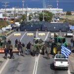 Greek farmers are blocked by police as they try to