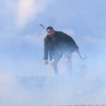 Greek farmers hurl stones amid tear gas at the Heraklion