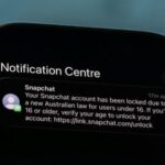 A notification from Snapchat requesting age verification is displayed on