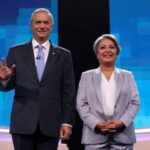 FILE PHOTO: Chile’s Presidential candidates attend the last televised debate