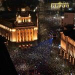 A drone view shows protesters demonstrating outside the parliament during
