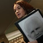 Belarusian opposition leader Sviatlana Tsikhanouskaya talks during an interview in