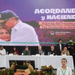 Colombian rebel group hands over war material, signs agreements with