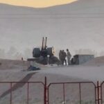 FILE PHOTO: Military personnel stand guard at Iran’s Isfahan nuclear