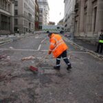 Aftermath of an incident where a car hit fans at