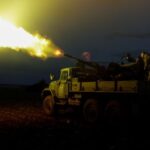 Ukrainian servicemen from mobile air defence unit fire an anti-aircraft