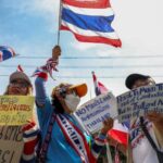 Royalist activists protest in front of the Royal Embassy of