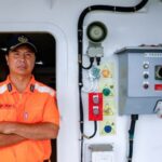 Juan Chung-Ching, a coast guard captain, poses for a photo