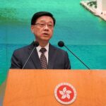 Hong Kong Chief Executive John Lee speaks during a press