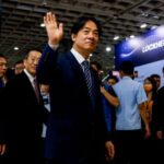 FILE PHOTO: Taiwan’s President Lai Ching-te waves as he visits