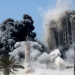 FILE PHOTO: Israeli strike hits the 15-storey Mushtaha Tower in