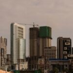 View of business offices and under construction residential apartments in