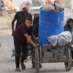Displaced Palestinians, fleeing northern Gaza due to an Israeli military