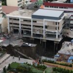 A massive sinkhole opens on Samsen Road near Vajira Hospital,