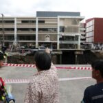 A massive sinkhole opens on Samsen Road near Vajira Hospital,