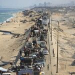Displaced Palestinians, fleeing northern Gaza due to an Israeli military