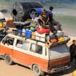 Displaced Palestinians, fleeing northern Gaza due to an Israeli military
