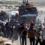 Displaced Palestinians fleeing northern Gaza due to an Israeli military