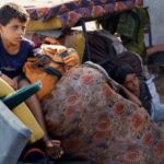 Displaced Palestinians move southward after Israeli forces ordered residents of