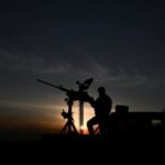 Ukrainian serviceman is seen during a combat shift in a