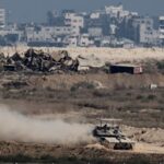 An Israeli tank manoeuvres in Gaza