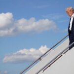 U.S. President Donald Trump returns to Washington