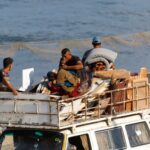 Displaced Palestinians fleeing northern Gaza move southward after Israeli forces