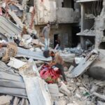 Aftermath of Israeli strike on Saturday on a house, in