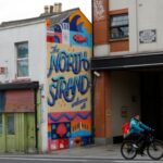 Right-wing activists divide Dublin with lamppost flag blitz