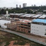 A building with a helipad under construction in Belem to