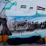 A displaced Palestinian man, who fled his home due to