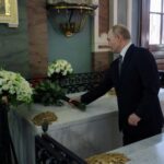 Russian President Putin visits a cathedral in Saint Petersburg