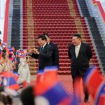 North Korean leader Kim Jong Un meets with Laotian President