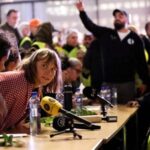Greta Thunberg and activists from the Global Sumud Flotilla hold