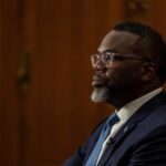 Chicago Mayor Brandon Johnson sits for an interview with a
