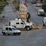 FILE PHOTO: UNIFIL vehicles drive in Qlayaa