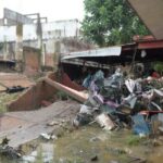 Torrential rains burst rivers, sparking floods in eastern Mexico