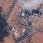 A satellite image shows trucks with aid at Kerem Shalom
