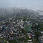 A drone view shows the port in Douala
