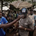 The Wider Image: Motorcycle taxi drivers of Cameroon’s Douala long