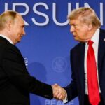 FILE PHOTO: U.S. President Trump meets with Russian President Putin