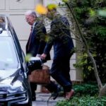 Former National Security Advisor John Bolton leaves his home in