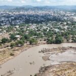 Drone view shows muddy floodwater after a river overflowed following