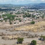 Drone view shows muddy floodwater after a river overflowed following