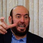 Hamas senior official Mohammed Nazzal speaks during an interview with