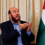 Hamas senior official Mohammed Nazzal speaks during an interview with